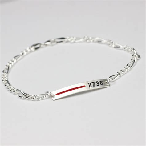 thin redline bracelet meaning